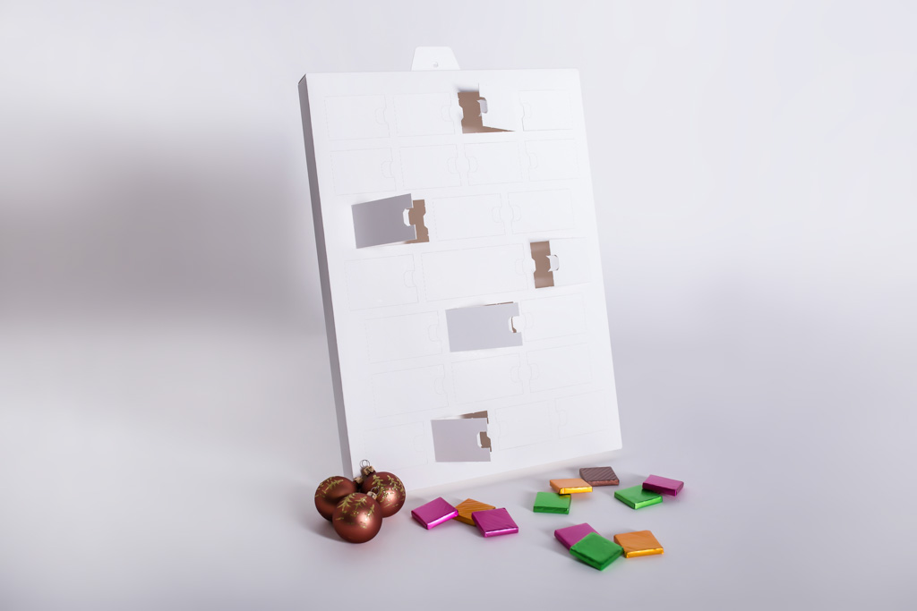 Ein Adventskalender mit Süßigkeiten gefüllt - Mugler Masterpack GmbH
