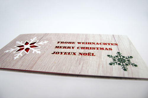Weihnachtskarte mit einer Laserstanzung – Mugler Masterpack GmbH